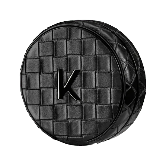 elegant kelly white weekend kelly refill case crafted from black woven leather with a checkered texture.